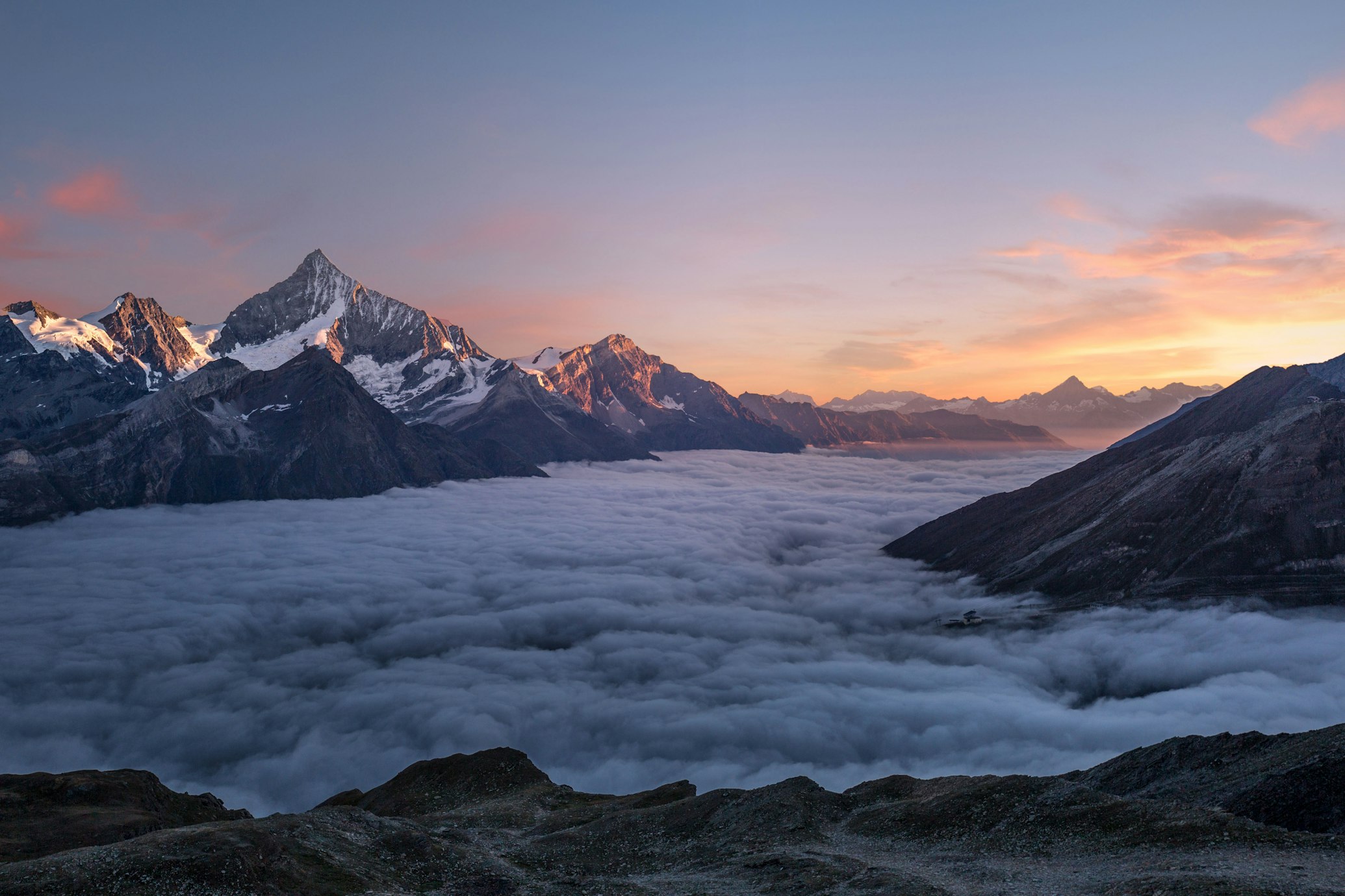 Beautiful sunset over mountains representing transformation and growth